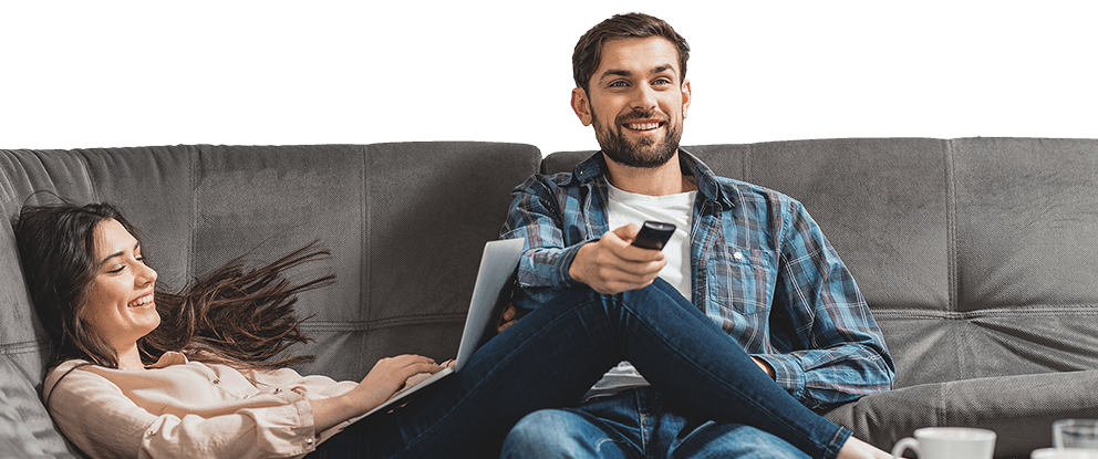 woman using laptop on a couch